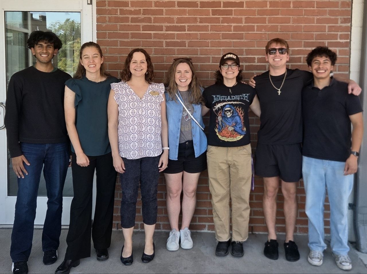Summer 2026 end-of-REU celebration with seven members of the Baber Lab and Weaver Lab