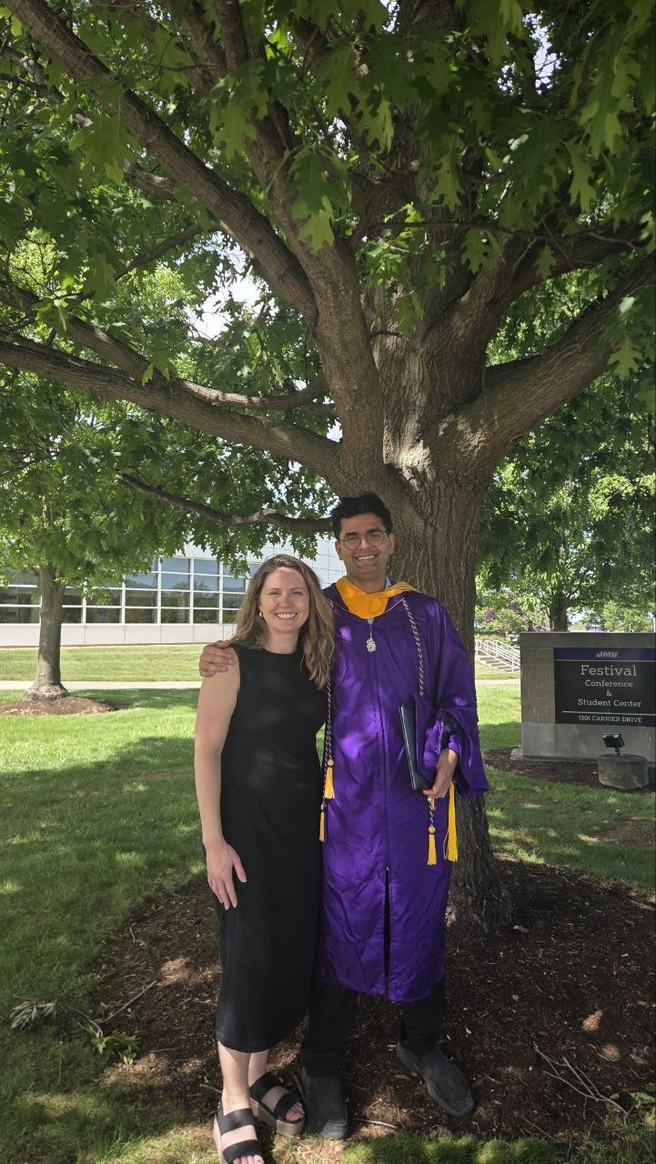 Jaimin Ashra and Dr. Baber celebrating after graduation